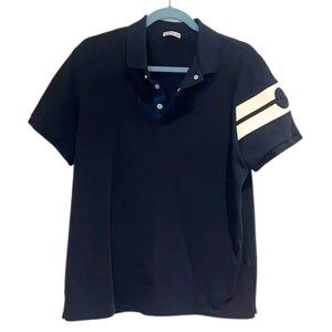 Moncler mens dark blue polo with sleeve details snap buttons and embossed logo